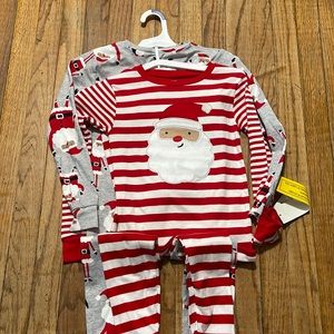 4 piece set. 2 tops and 2 bottoms. Christmas pajamas.